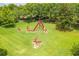 Abstract metal sculptures in a green lawn setting at 7127 Harmony Square S Dr # 7127, Harmony, FL 34773