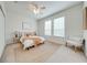 Spacious bedroom with a ceiling fan and neutral decor at 7127 Harmony Square S Dr # 7127, Harmony, FL 34773