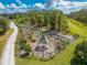 Well-maintained community garden with individual plots and a gazebo at 7127 Harmony Square S Dr # 7127, Harmony, FL 34773