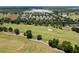 Expansive view of the community and surrounding golf course at 7127 Harmony Square S Dr # 7127, Harmony, FL 34773
