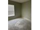 Empty bedroom with window blinds and neutral walls at 2796 Whispering Trails Dr, Winter Haven, FL 33884