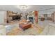 Spacious living area with a fireplace and an open floor plan to the kitchen at 1395 Emerald Dr, Kissimmee, FL 34744