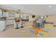 Bright and spacious Florida room with kitchen, dining and living areas at 1395 Emerald Dr, Kissimmee, FL 34744