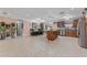 Modern kitchen with stainless steel appliances and an island at 1395 Emerald Dr, Kissimmee, FL 34744