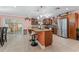 Updated kitchen featuring granite countertops and ample cabinet space at 1395 Emerald Dr, Kissimmee, FL 34744