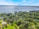 Aerial view showcasing property's waterfront location near the lake at 5525 Alligator Lake Rd, Saint Cloud, FL 34772