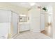 Bathroom with shower, tub, and white vanity at 805 Via Bianca Dr, Davenport, FL 33896