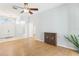 Living room with wood floors and access to the front entrance at 805 Via Bianca Dr, Davenport, FL 33896