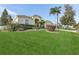 Single-Gathering home with lush landscaping and palm trees at 805 Via Bianca Dr, Davenport, FL 33896