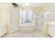 Bathroom boasts a large soaking tub and walk-in shower at 805 Via Bianca Dr, Davenport, FL 33896