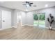 Spacious bedroom with sliding glass doors and neutral wall colors at 135 S Chandler Ave, Deland, FL 32724