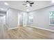 Spacious bedroom with hardwood floors and access to bathroom at 135 S Chandler Ave, Deland, FL 32724