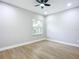 Grey walls, hardwood floors and a window with natural light at 135 S Chandler Ave, Deland, FL 32724