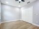 Bedroom with hardwood floors and double door closet at 135 S Chandler Ave, Deland, FL 32724