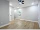 Bright bedroom with ceiling fan and hardwood floors at 135 S Chandler Ave, Deland, FL 32724