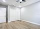 Bedroom with hardwood floors and double door closet at 135 S Chandler Ave, Deland, FL 32724