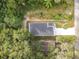Aerial view showcasing the house and surrounding landscape at 135 S Chandler Ave, Deland, FL 32724