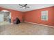 Spacious living room with tile floors and neutral walls at 6829 Sundrop St, Harmony, FL 34773