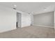 Spacious bedroom with carpet, and access to bathroom and hallway at 2692 Meadowedge Loop, St Cloud, FL 34772