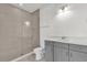 Clean bathroom with gray vanity and glass shower at 2692 Meadowedge Loop, St Cloud, FL 34772