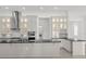 Spacious kitchen with white cabinets and granite countertops at 2692 Meadowedge Loop, St Cloud, FL 34772