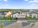 Two-story house in a community with a pond at 2692 Meadowedge Loop, St Cloud, FL 34772