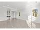 Spacious living room with tile floors and large windows at 2692 Meadowedge Loop, St Cloud, FL 34772