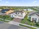 Two-story house in a community with a pond at 2692 Meadowedge Loop, St Cloud, FL 34772