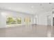 Bright living room with pool view and sliding glass doors at 2692 Meadowedge Loop, St Cloud, FL 34772