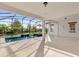 Inviting screened-in pool and patio area at 2692 Meadowedge Loop, St Cloud, FL 34772