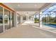 Spacious covered patio overlooking a refreshing pool and lush landscaping at 2692 Meadowedge Loop, St Cloud, FL 34772