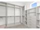 Spacious walk-in closet with built in drawers and shelves at 2692 Meadowedge Loop, Saint Cloud, FL 34772