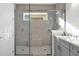 Modern bathroom with large shower, double vanity and built in bench at 2692 Meadowedge Loop, St Cloud, FL 34772