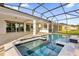 Private screened pool and spa perfect for relaxation at 2692 Meadowedge Loop, St Cloud, FL 34772