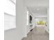 Bright and airy living room with tile flooring and large windows at 2692 Meadowedge Loop, St Cloud, FL 34772