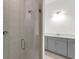 Bathroom featuring a glass shower and gray vanity at 2692 Meadowedge Loop, St Cloud, FL 34772
