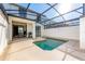 Private pool and patio area with grill at 8932 Stinger Dr, Davenport, FL 33896