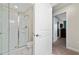 Small bathroom with a shower and toilet at 8932 Stinger Dr, Davenport, FL 33896