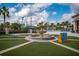 Relaxing courtyard with fountain and Connect Four game at 8932 Stinger Dr, Davenport, FL 33896