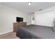 Spacious bedroom with a queen-size bed and ample closet space at 8932 Stinger Dr, Davenport, FL 33896