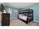 Fun bedroom with a bunk bed and plenty of storage at 8932 Stinger Dr, Davenport, FL 33896