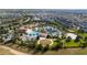 Resort-style pool with surrounding lounge chairs and landscaping at 8932 Stinger Dr, Davenport, FL 33896