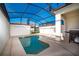 Private screened pool with tiled deck at 8932 Stinger Dr, Davenport, FL 33896