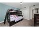 Bedroom with a bunk bed, ideal for or guests at 8932 Stinger Dr, Davenport, FL 33896