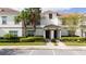 Two-story townhome with landscaping and parking at 8932 Stinger Dr, Davenport, FL 33896
