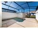 Private screened pool with tiled deck at 8932 Stinger Dr, Davenport, FL 33896