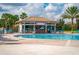Tropical themed pool with a swim-up bar at 8932 Stinger Dr, Davenport, FL 33896