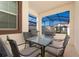 Covered patio with table, chairs, and grill at 8932 Stinger Dr, Davenport, FL 33896
