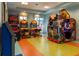Game room with various arcade games at 8932 Stinger Dr, Davenport, FL 33896