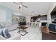 Open living space with comfortable seating and TV at 8932 Stinger Dr, Davenport, FL 33896